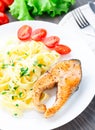 Delicious fettuccini with fried salmon Royalty Free Stock Photo