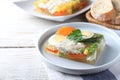 Delicious fish aspic served on white wooden table Royalty Free Stock Photo