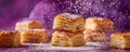 Delicious Flaky Sugar Coated Puff Pastries on a Purple Background with Icing Sugar Being Sprinkled