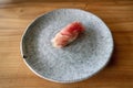 delicious and flavorful toro piece of sushi at fine dining restaurant during the day Royalty Free Stock Photo