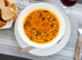 Chickpea and spinach curry stew on white plate