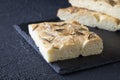 Delicious focaccia - Italian bread - according to a traditional recipe consisting of flour, olive oil, water, yeast, Fleur de Sel Royalty Free Stock Photo