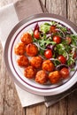 Delicious food: fried chicken meatballs salad of tomato, lettuce Royalty Free Stock Photo