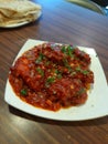 Delicious food fish Manchuria tasty spicy fish food dishes decorated with coriander