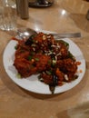 Delicious food chicken Manchuria tasty spicy fish food dishes decorated with coriander