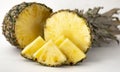 Delicious fragrant appetizing pineapple cut into slices for dessert with a light background