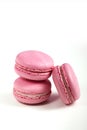 Delicious french dessert. Three gentle soft pink purple cakes macaron or macaroon