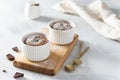 Delicious french fondant with hot chocolate centre in ceramic molds. Lava cake recipe, menu. Side view, copy space Royalty Free Stock Photo