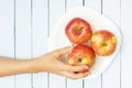 Delicious fresh apples on wooden table. Top view on organic fruit. Healthy food concept