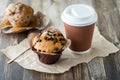 Delicious fresh baked muffins served with coffee, ready for snacking. Royalty Free Stock Photo