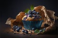 Delicious fresh blueberry muffins with mint leaves