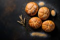 Delicious fresh bread buns, wheat ears and flour on black chalkboard background, top view, flat lay, copy space Royalty Free Stock Photo