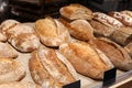 Delicious fresh bread on shelf in bakery Royalty Free Stock Photo