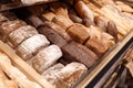 Delicious fresh bread on shelf in bakery Royalty Free Stock Photo