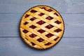 Delicious fresh cherry pie on light grey wooden table, top view Royalty Free Stock Photo