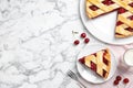 Delicious fresh cherry pie served on white marble table, flat lay. Space for text Royalty Free Stock Photo