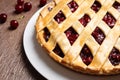 Delicious fresh cherry pie on wooden table, closeup Royalty Free Stock Photo