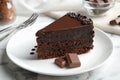 Delicious fresh chocolate cake served on marble table Royalty Free Stock Photo