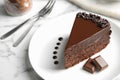 Delicious fresh chocolate cake served on marble table Royalty Free Stock Photo