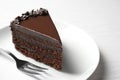 Delicious fresh chocolate cake served on white table Royalty Free Stock Photo