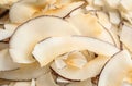 Delicious fresh coconut chips as background Royalty Free Stock Photo
