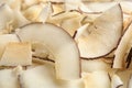 Delicious fresh coconut chips as background Royalty Free Stock Photo