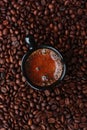 Delicious fresh coffee in a black mug Royalty Free Stock Photo