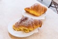 Delicious, fresh croissants on a table in a cafe