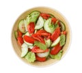Delicious fresh cucumber tomato salad in bowl, top view Royalty Free Stock Photo