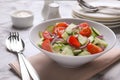 Delicious fresh cucumber tomato salad on table Royalty Free Stock Photo