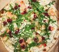 Delicious fresh and flavorful Italian pizza with salmon, arugula greens and spicy cranberry sauce. Quick and satisfying snack and
