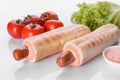 Delicious fresh French hot dog grill with a bun, dairy sausage and sauce Royalty Free Stock Photo