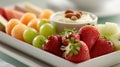 Delicious fresh fruit platter with a creamy almond dip Royalty Free Stock Photo