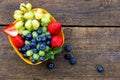 Delicious fresh fruits on a wooden table Royalty Free Stock Photo