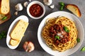 Delicious fresh homemade spaghetti bolognaise with salad and garlic bread Royalty Free Stock Photo