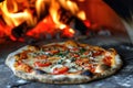 Delicious fresh Italian pizza lies near the oven, baked in a wood-burning oven