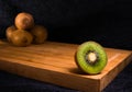 Delicious fresh kiwi fruit on a chopping board vitamin