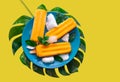Delicious fresh mango popsicle served with mint leaves and ice cubes isolated on yellow background Royalty Free Stock Photo