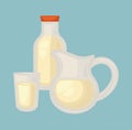 Delicious fresh milk in small glass, big jug and bottle with cover Royalty Free Stock Photo