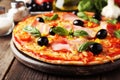 Delicious fresh pizza on brown wooden background Royalty Free Stock Photo