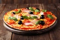 Delicious fresh pizza on brown wooden background Royalty Free Stock Photo