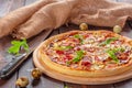 Delicious fresh pizza served on wooden table Royalty Free Stock Photo