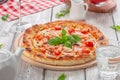 Delicious fresh pizza served on wooden table Royalty Free Stock Photo