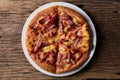 Delicious fresh pizza served on wooden table Royalty Free Stock Photo