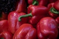 Delicious and fresh red Capsicums or red pepper vegetables on a fruit market Royalty Free Stock Photo