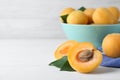 Delicious fresh ripe apricots on white background. Space for text Royalty Free Stock Photo