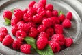 Delicious fresh ripe raspberries on plate Royalty Free Stock Photo