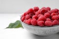 Delicious fresh ripe raspberries on white wooden table, closeup Royalty Free Stock Photo