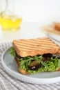 Delicious fresh sandwich with eggplant on table Royalty Free Stock Photo