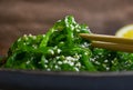 Delicious fresh seaweed salad  food   vegan   marinated  sesame seeds Royalty Free Stock Photo